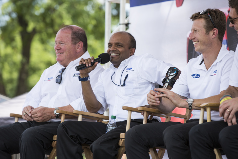 Raj Nair, flanked by Chip Ganassi and Ryan Briscoe, discusses Ford's victory at Le Mans.